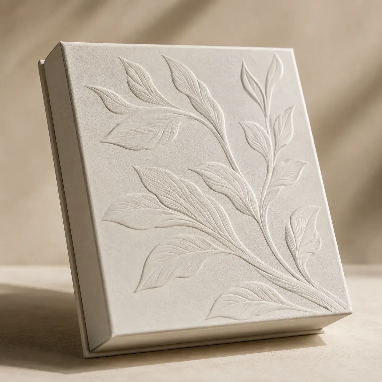 Embossed detail on cosmetic packaging