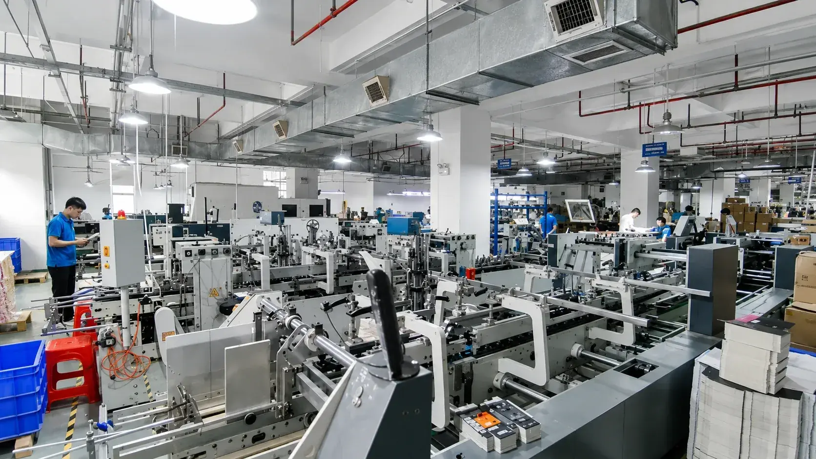 Packaging factory workshop for controlled e-commerce packaging production.