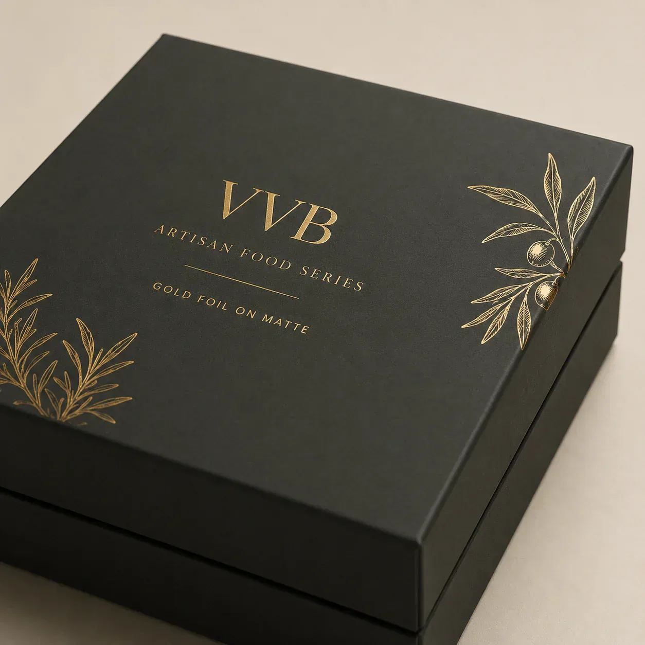 Gold foil detailing on matte black food packaging